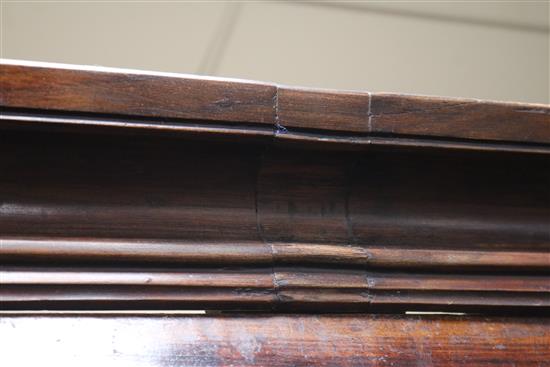 An 18th century French fruitwood armoire W.150cm
